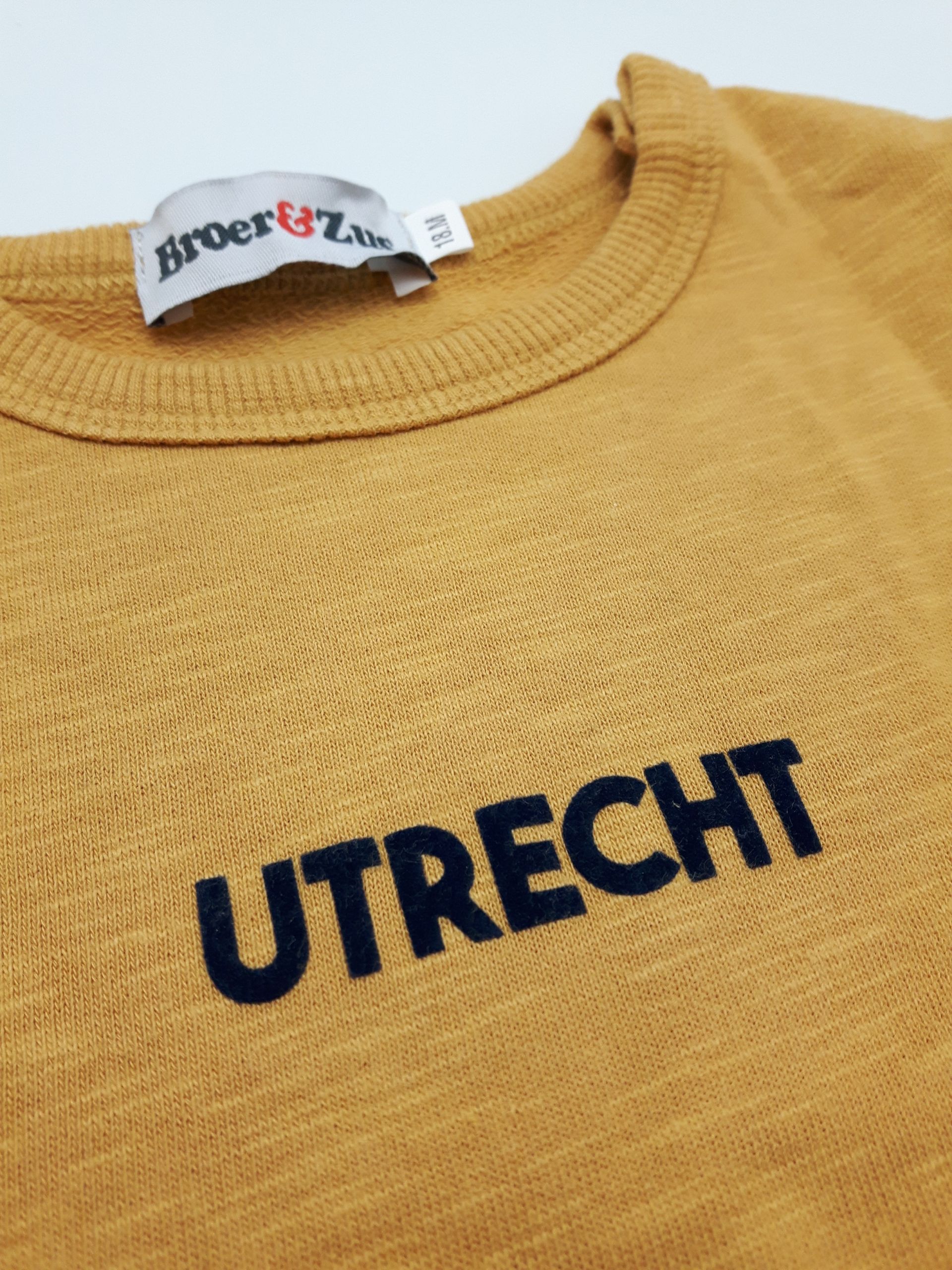 Sweater Utrecht mosterd navy flock 18 maanden